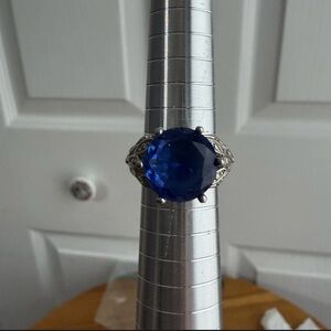 Blue sapphire round stone silver color filigree band size 7